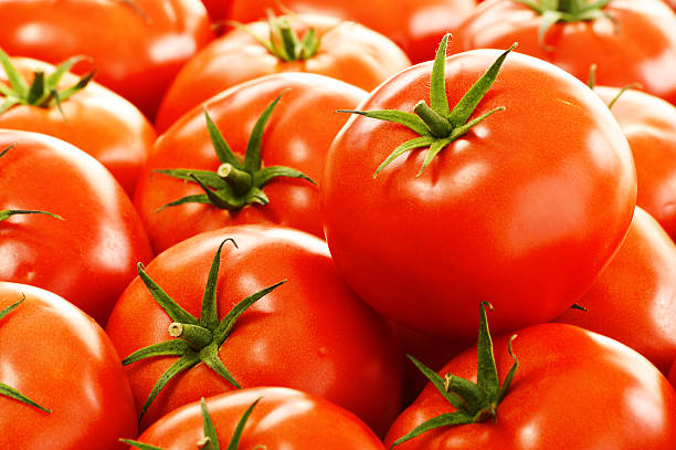 istock Fresh organic tomatoes on street stall 510512097