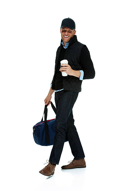 istock Man walking with duffle bag and disposable cup 510513209