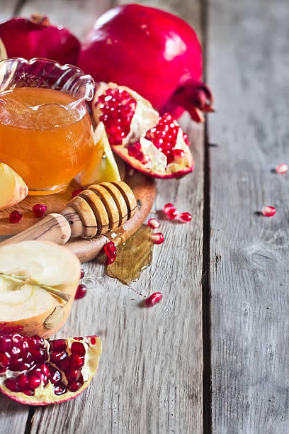istock Pomegranate, apples and honey background 510514173