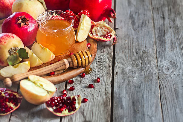 istock Pomegranate, apples and honey background 510514175