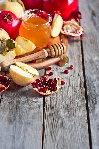 istock Pomegranate, apples and honey background 510514179