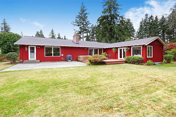 istock Bright red house with walkout deck and patio area 510515969