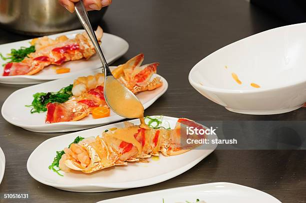 Decorating Cooked Lobster On Plate Stock Photo - Download Image Now - Activity, Appetizer, Boiled