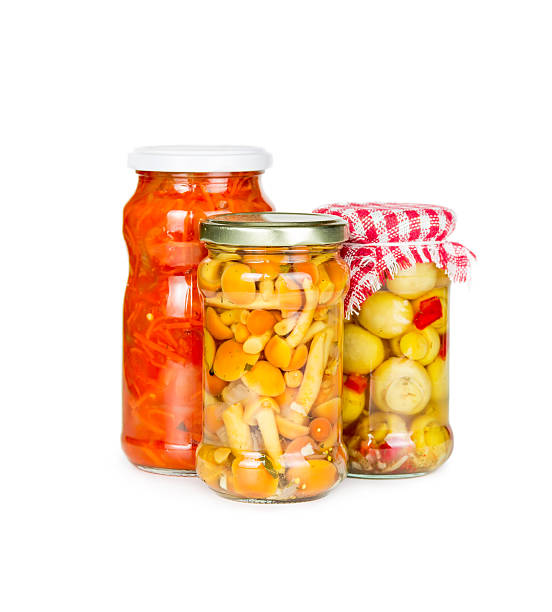 istock Canned vegetables in glass jars 510516355