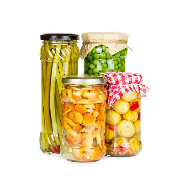 istock Canned vegetables in glass jars 510516359