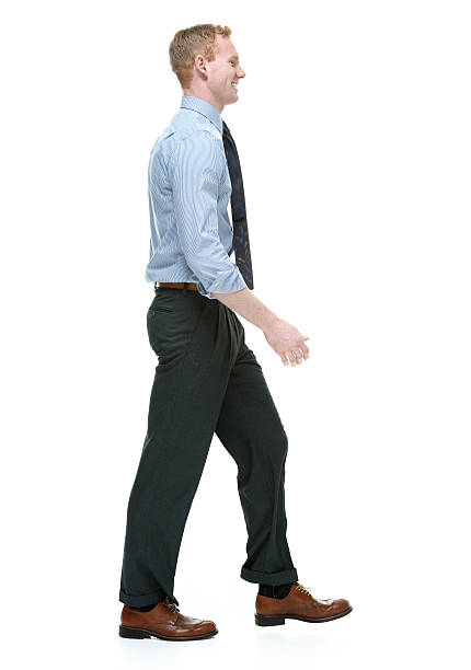 istock Cheerful businessman walking 510516865