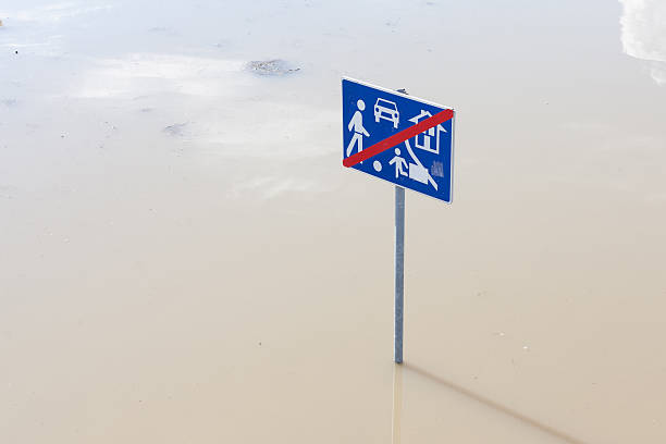istock flooded traffic sign 510517917
