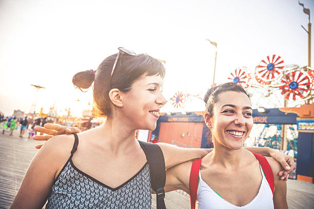 Two friends at amusement park