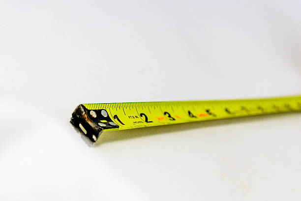 istock yellow extended tape measure 510537495