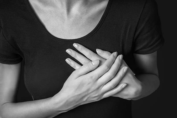 istock Woman is clutching her chest, heart attack 510538843