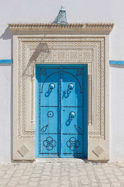 istock old blue entrance door in Tunisia 510560972