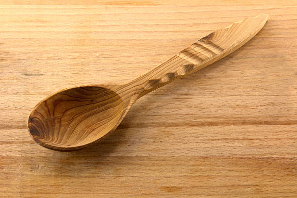 istock Wooden spoon on the board 510561324