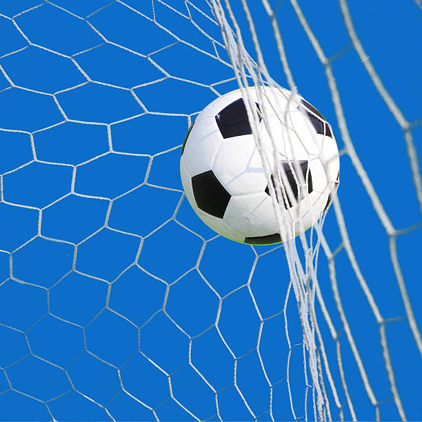istock soccer ball in goal 510563313