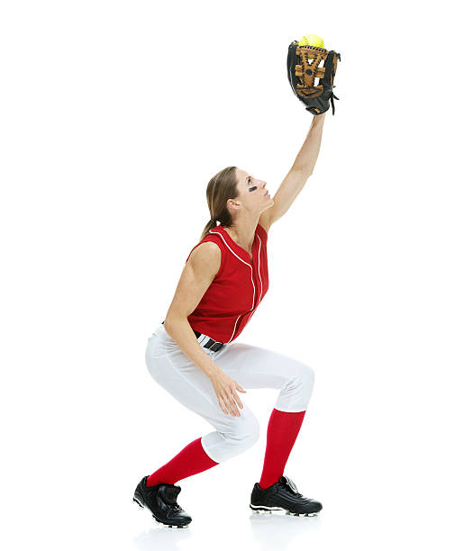 istock Softball player catching a ball 510563408