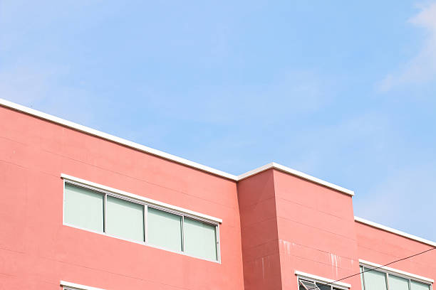istock Orange building with sky 510563589