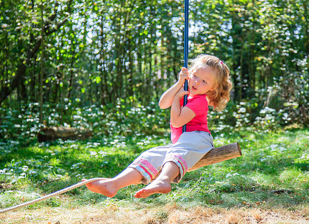Little playing in forest