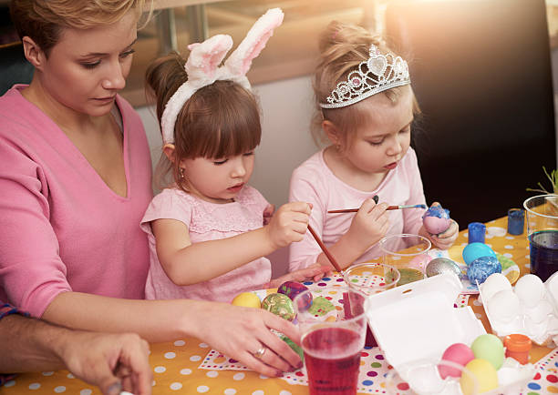 istock Creative daughters and their cheerful mother 510564074