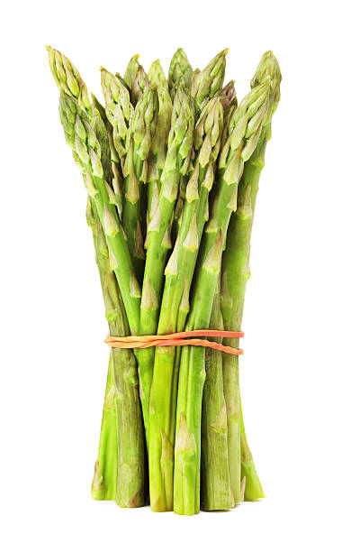 Bunch Of Green Asparagus bunch of fresh green asparagus, isolated on white asparagus stock pictures, royalty-free photos & images