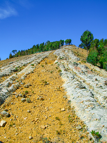 Dry and rocky soil of Isla del Sol on Lake Titicaca, Bolivia