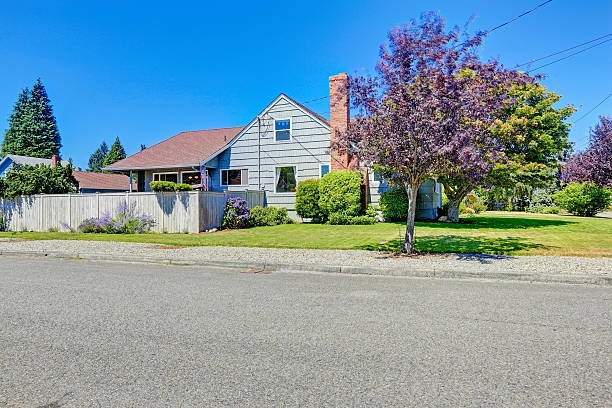 istock House exterior with brick chimney. Front yard view 510567531