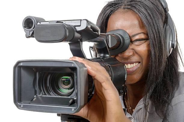istock young African American women with professional video camera and 510568650