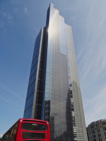 Heron Tower and London bus, City of London. Officially Salesforce Tower, Heron Tower is, at the time of writing, the tallest building in the City of London financial district, and the third tallest in London.