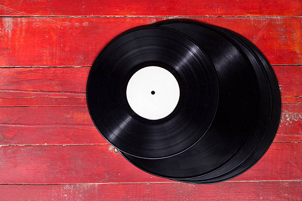 istock Vinyl records on wooden surface. 510571966