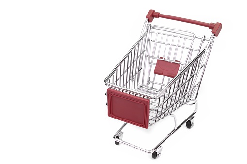 New Empty Shopping Cart  With Red Advertising Display Isolated On White Background , Close Up, High Angle View