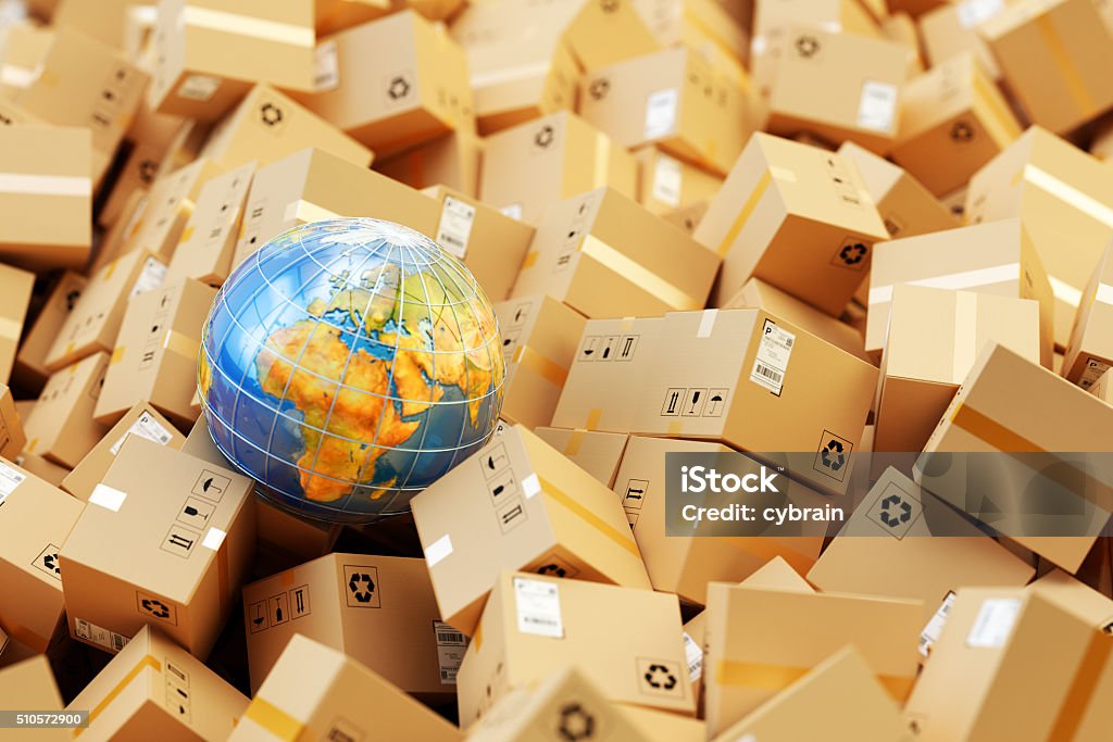 Distribution warehouse, international package shipping, global freight transportation concept Background with heap of cardboard boxes, parcels and Earth globe Global Business Stock Photo