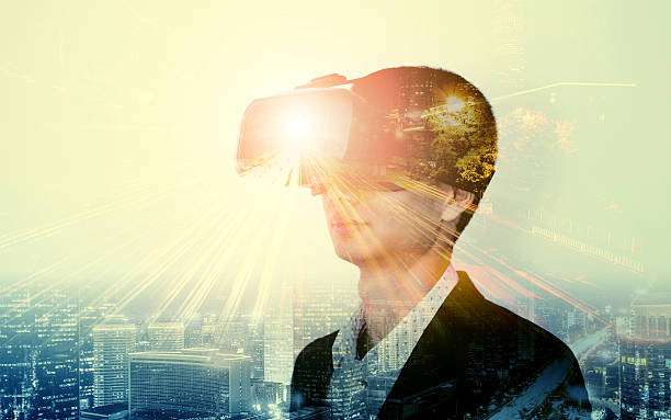 istock Double exposure of man wearing virtual reality headset 510573330