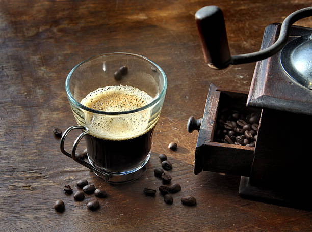 istock cup of coffe and mill 510573536