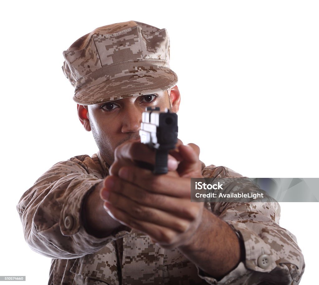 African American Military Man Aims Weapon Shot in Moreno Valley, California in December of 2015. Military Policeman Stock Photo