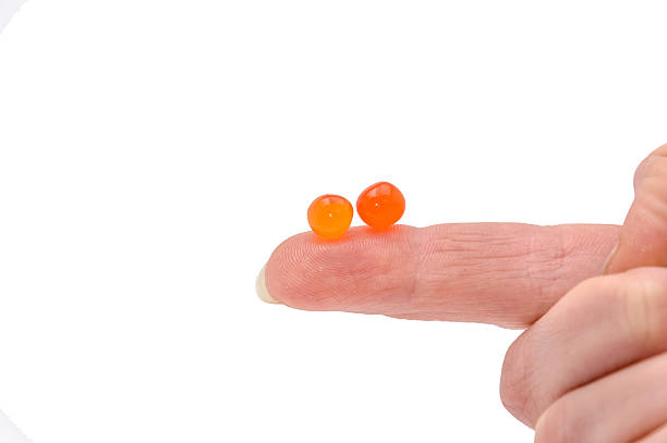 istock caviar on a finger on  white 510574880