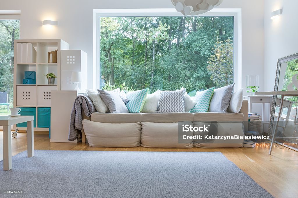 Spacious place for relax Image of spacious place for relax with big sofa Window Stock Photo