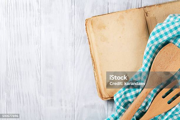 Kitchen Table With Recipe Book And Utensils Stock Photo - Download Image Now - Above, Baking, Blank