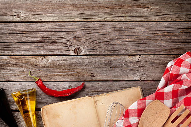istock Kitchen table with recipe book and ingredients 510578290