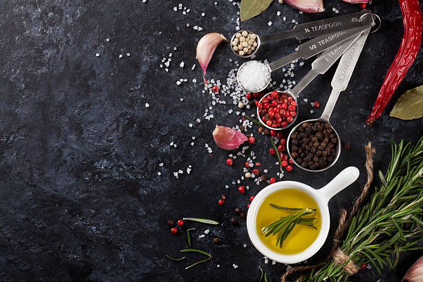 istock Herbs and spices over black stone 510578900