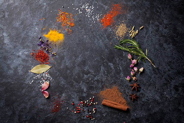istock Herbs and spices over black stone 510579110