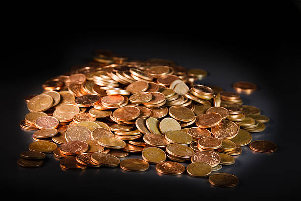 istock Piles of coins 510579896