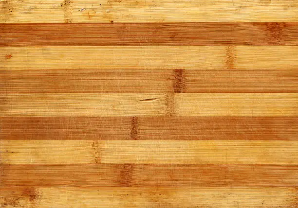 Bamboo wood scratched board realistic photo texture. Warm striped background for your design