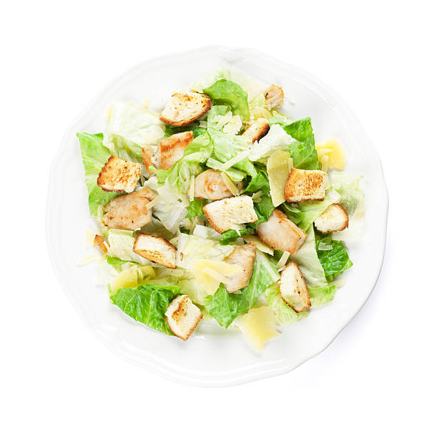 fresh healthy caesar salad - kruton stok fotoğraflar ve resimler