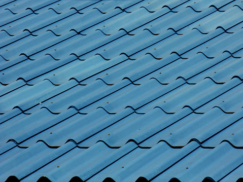 With soil or other object Roofing sheets used as flooring or wall.