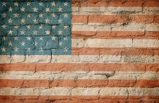 istock USA flag painted on brick wall 510584590