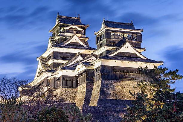 Kumamoto, Japan - December 9, 2015: Kumamoto Castle at dusk. The castle dates to 1467 and was reconstructed in 1960.