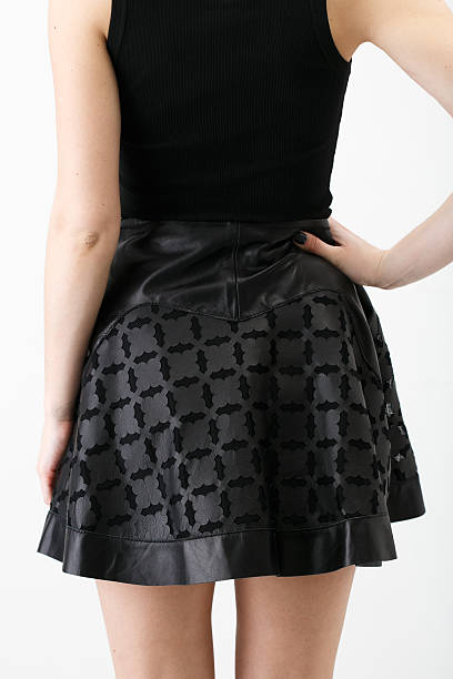 istock Young woman in black leather 510587538