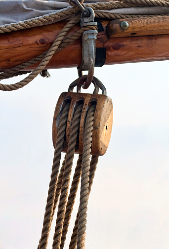 Closeup on a pulley on a sailboat