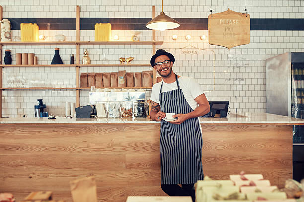 istock Happy young coffee shop owner 510590982