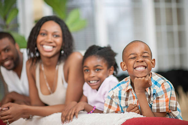 istock Family Sitting on a Couch 510591166