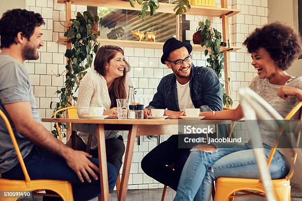 Friends Having A Great Time In Cafe Stock Photo - Download Image Now - Friendship, Talking, Discussion