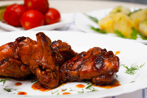 istock chicken grilled with boiled potatoes and pickled tomatoes 510610724